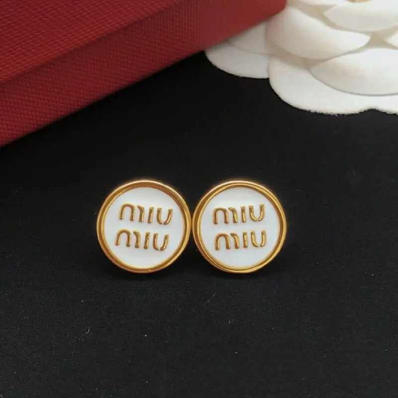 miu miu boucles doreilles pour femme s_12631543